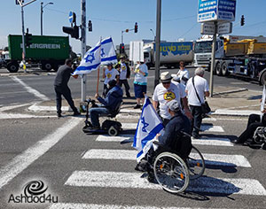 מחאת הנכים – בכניסה לעיר אשדוד לבאים דרך כביש 41